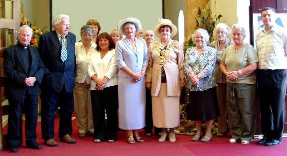 The Mayor and Mayoress of Blackburn opened the Flower Festival with Fr Birmingham (far left) and some of the many volunteers